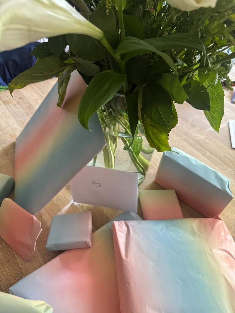 Presents, wrapped, and flowers