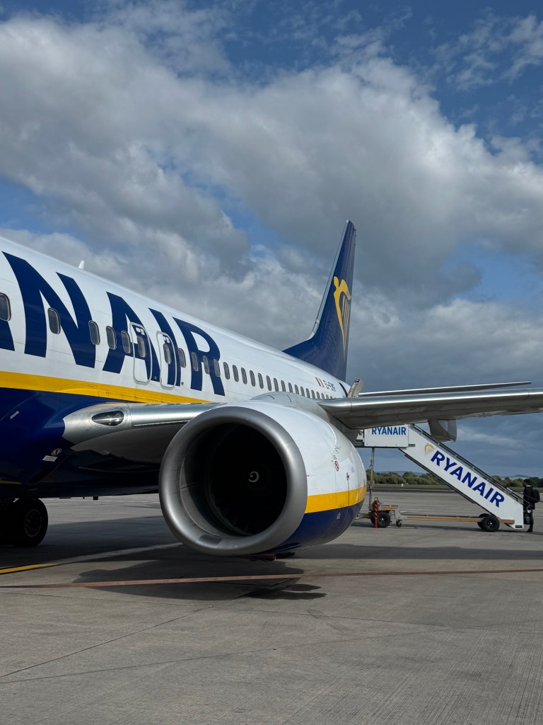 A Ryanair plane on the tarmac at an airport